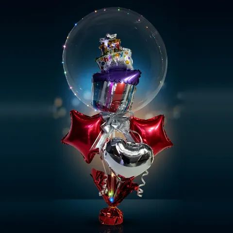 Arreglo burbuja con regalos y estrellas